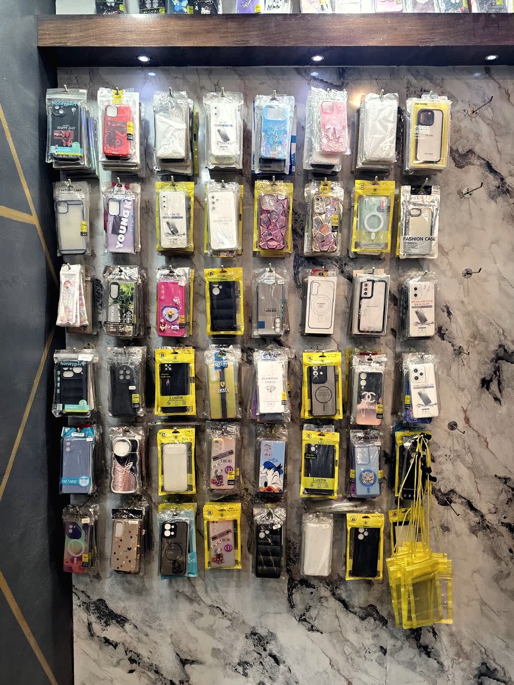 Wall display of mobile phone cases and covers